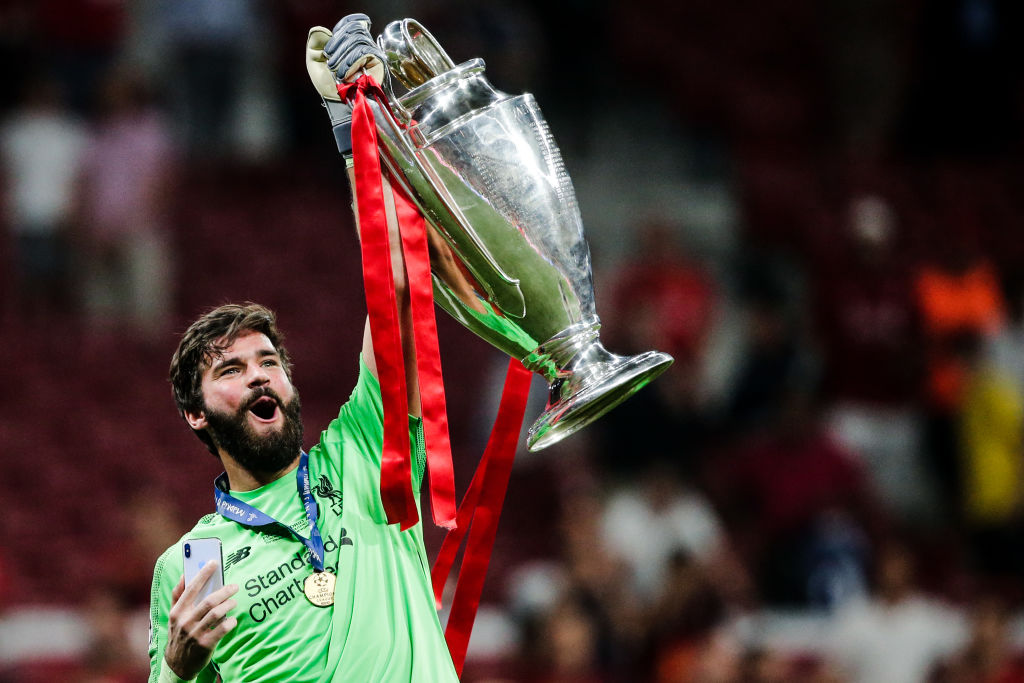 lisson Becker of Liverpool FC, celebrates the victory with the trophy during the UEFA Champions Leaguematch between Tottenham Hotspur v Liverpool