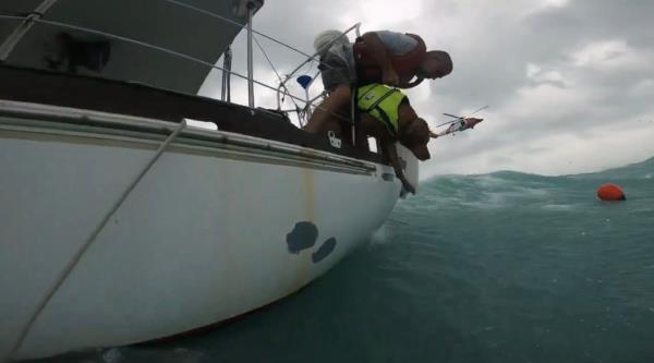 Coast Guard rescuers first helped save the dog from the boat.