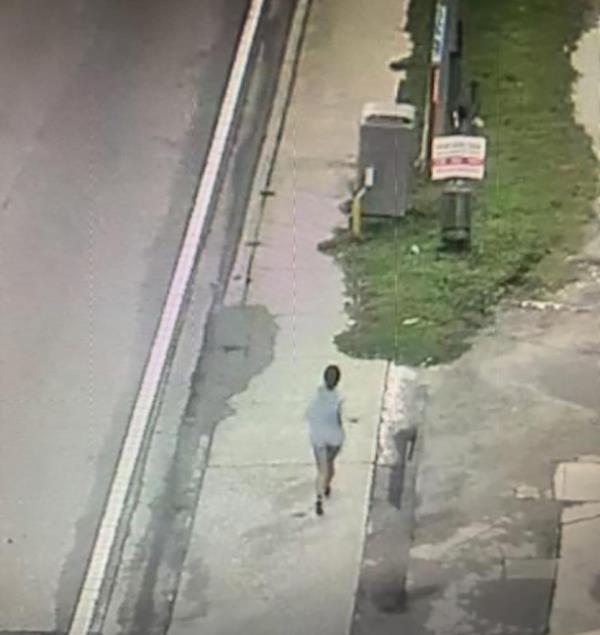 Surveillance footage of Valdes jogging down a street.